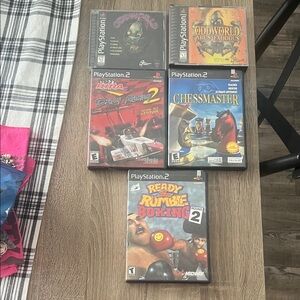 Sony PlayStation 2 Game Set - Black Cases